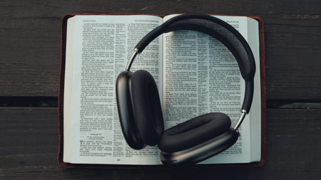 black-headphones-on-book